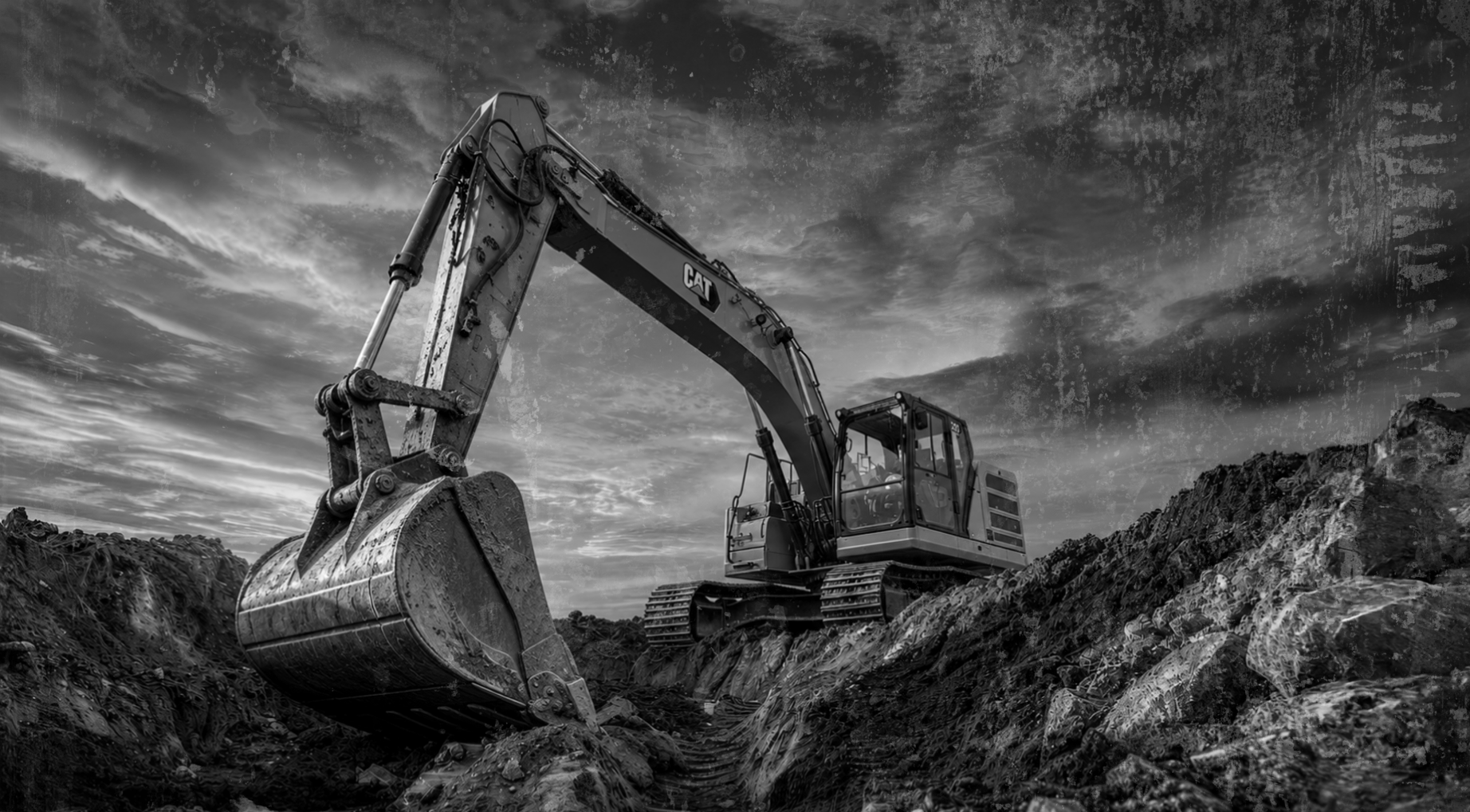 Hydraulic excavator on a civil construction site at golden hour